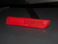 08-15 Mitsubishi Lancer EVO OEM Rear Bumper Light Reflector Lens - Right