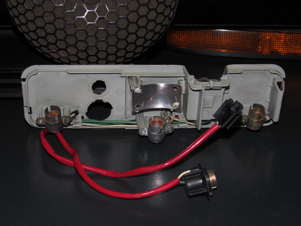 82 83 Toyota Supra OEM Tail Light Bulb Scoket Panel - Left