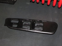 00-05 Mitsubishi Eclipse Spyder OEM Window Switch Bezel Cover Trim - Left