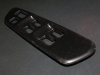 00-05 Mitsubishi Eclipse Spyder OEM Window Switch Bezel Cover Trim - Left