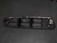 00-05 Mitsubishi Eclipse Spyder OEM Window Switch Bezel Cover Trim - Left